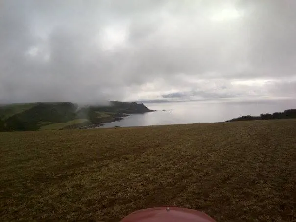 Sea mist rolling over the coast near the farm